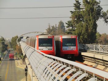 Train on railroad track against sky