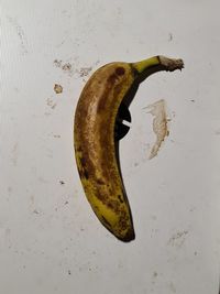 High angle view of bananas on table against wall