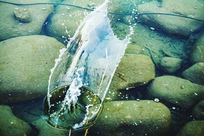 High angle view of ice on sea shore