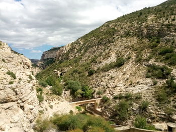 Scenic view of rocky mountains against sky