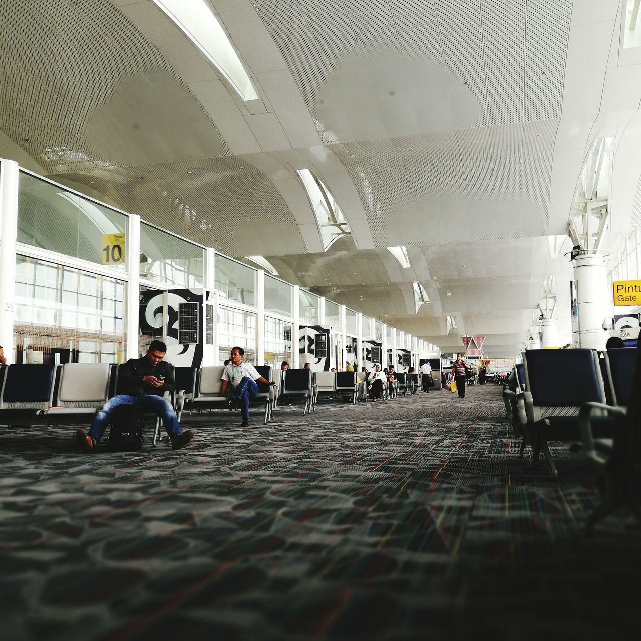 airport, real people, leisure activity, large group of people, indoors, architecture, day, people, adults only, adult