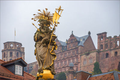 Low angle view of statue in city