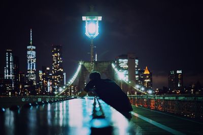 Illuminated buildings in city at night