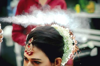 Close-up of bride with hairstyle