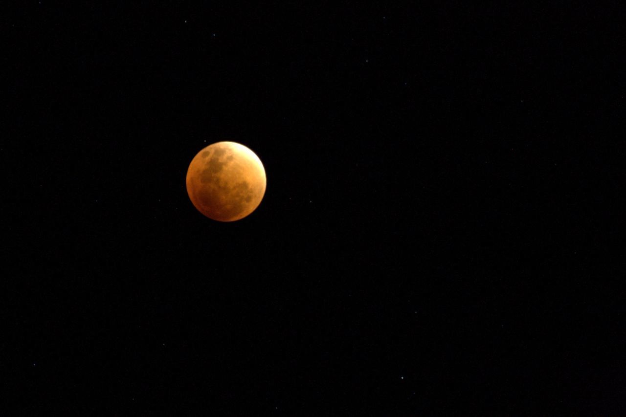 moon, astronomy, full moon, planetary moon, night, low angle view, moon surface, circle, scenics, beauty in nature, discovery, copy space, tranquil scene, sphere, space exploration, tranquility, exploration, nature, clear sky, sky