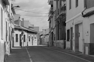 Street amidst buildings in city