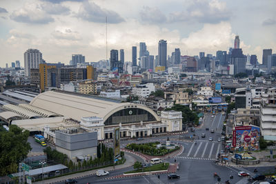 High angle view of buildings in city against sky