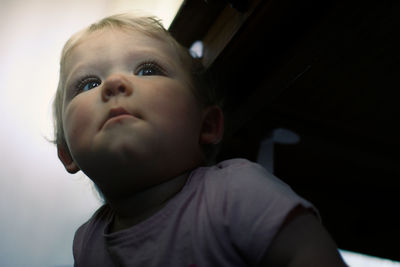 Portrait of cute boy looking away