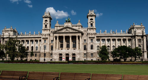 Low angle view of building against blue sky