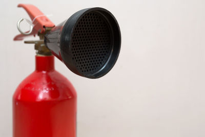 Close-up of bottle against white background