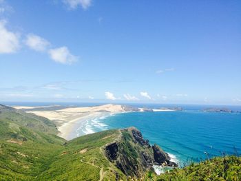 Scenic view of sea against blue sky