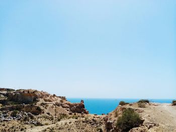 Panoramic view of sea against clear sky