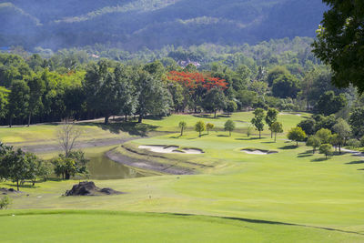 High angle view of golf course against sky