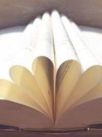 Close-up of heart shape on book