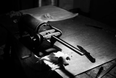 Cropped image of man holding equipment