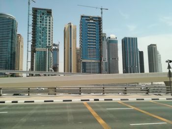 Modern buildings in city against sky