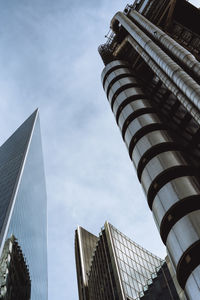 Low angle view of modern buildings against sky