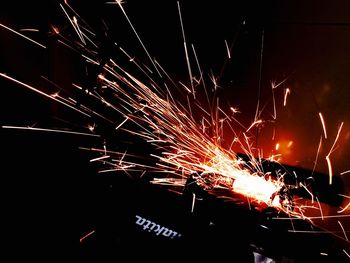 Low angle view of firework display