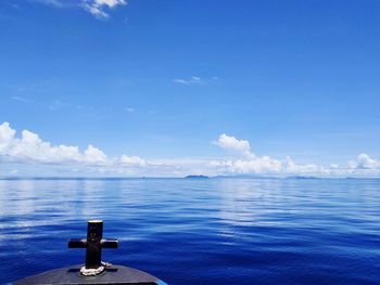 Scenic view of sea against blue sky