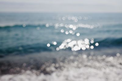 Defocused image of sea against sky