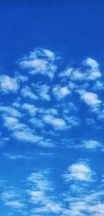 Low angle view of clouds in blue sky