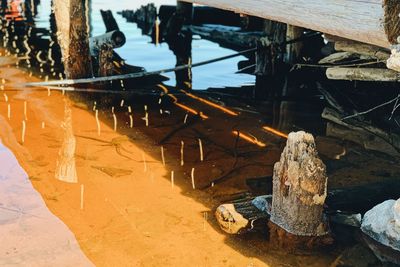 High angle view of old metal structure in water