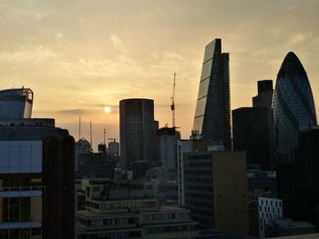 View of cityscape against sky during sunset