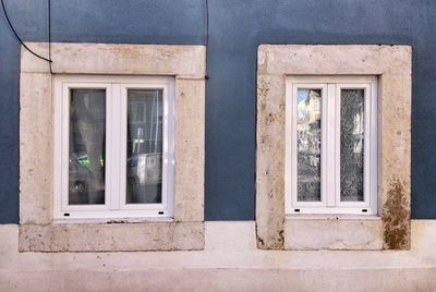 Full frame shot of window on wall of building