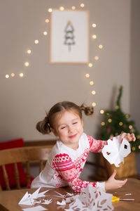 Portrait of smiling girl at home