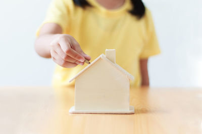 Close-up of child holding hand