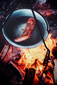 High angle view of meat in cooking pan