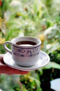 Close-up of coffee cup on table