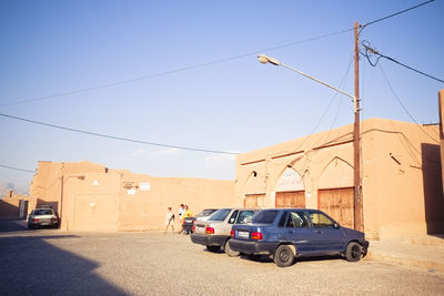 View of cars parked outside houses