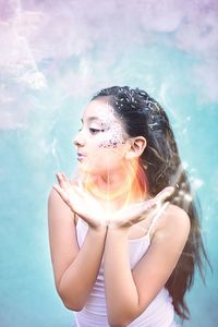 Portrait of young woman in swimming pool
