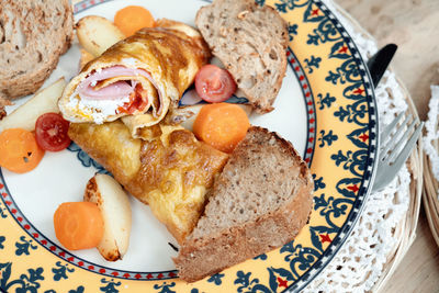 High angle view of breakfast served on table