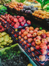 High angle view of red fruits for sale in market