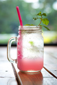 Close-up of drink in mason jar on table