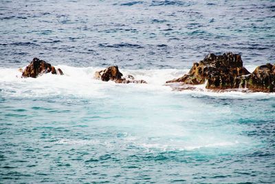 Scenic view of sea and rocks