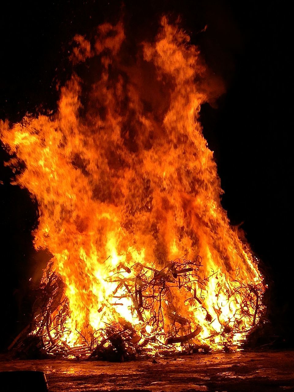 VIEW OF BONFIRE AT NIGHT DURING AUTUMN