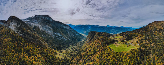 Panoramic view of landscape and mountains against sky