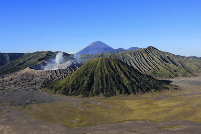 Panoramic view of volcanic landscape against clear sky