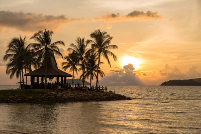 Scenic view of sea against sky at sunset