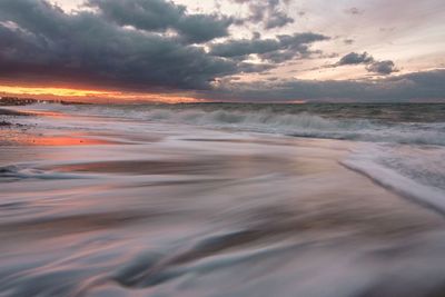 View of sea against dramatic sky