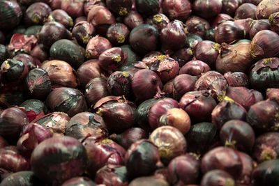 Full frame shot of onions for sale at market stall
