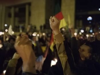 Group of people in the street at night