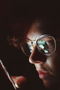 Close-up of woman using mobile phone