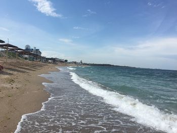 Scenic view of beach against sky