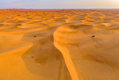 Scenic view of desert against sky