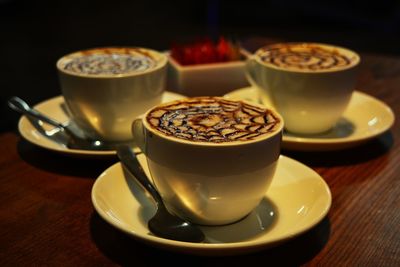 Close-up of coffee cup on table