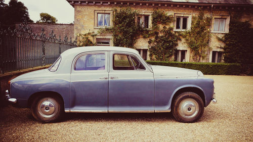 Vintage car on building